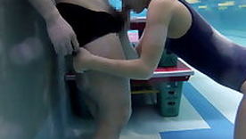 Japanese schoolgirls give play at coach underwater blowjob