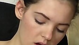 Ponytailed teen cutie rubs her pussy with a dildo