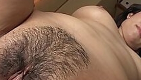 Mature brunette Asian gets her hairy cunt filled up
