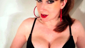 Aroused housewife in red satinates himself in latex