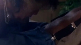 Vintage Marilyn Chambers in a hardcore blowjob and handjob scene