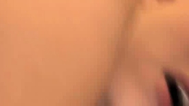 A Jersey Cummings fetish photograph featuring a Latina floozy gagging on a big cock