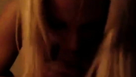 Blonde beauty indulges in dispirited doll play