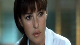 Monica Bellucci's stunning decolletage all round a revealing funereal rags