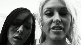 Busty bikini babes flaunt their physiques in open-air session