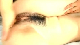 Japanese amateur Yui Komiya exposes her hairy pussy and fat breasts