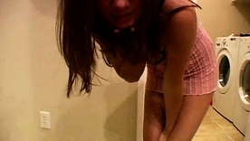 Kate, the bold brunette, provocatively flaunts her alluring assets