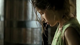 Laetitia Casta, renowned model, poses with open arms