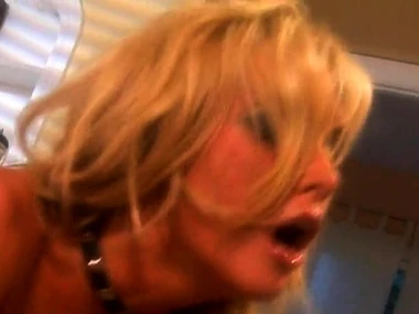 Blonde adult film actress Kayden Kross engages in intense sexual activity