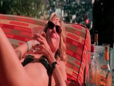 Uma Thurman poses imported in a yellow bikini