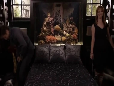 Redhead Judy Greer's sensual striptease by the bed