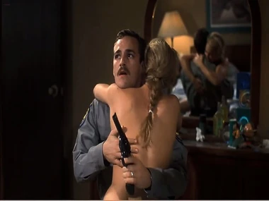 Blonde Ashley Judd bares her breasts in an intimate assembly room scene with a man