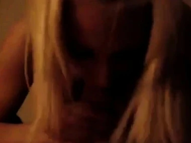 Blonde beauty indulges in dispirited doll play