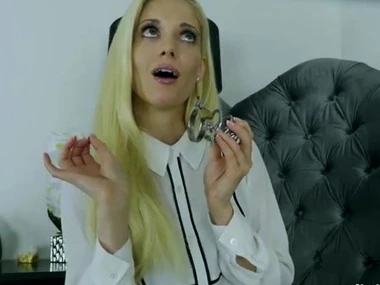 Blonde beauty Charlotte Stokely's tantalizing lock-and-key solo show