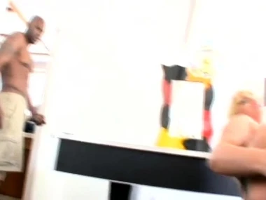 Blonde beauty Flower Tucci gives a lustful blowjob and handjob to a frowning cock