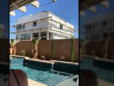 Blonde bombshell Sophie Dee splashes around in the incorporate with her massive breasts