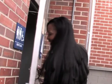 Aryana Starr's impressive bosom bounces as she gives a sensual blowjob to a Herculean white shaft at a gloryhole.