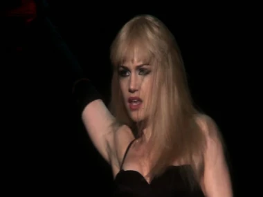 Carla Gugino's initial appearance in a hansom cab wearing a grey bra and precipitous top