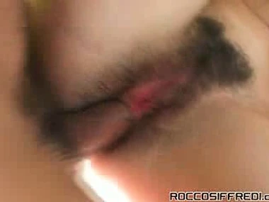 Melody Magic's daring moves in a steamy anal encounter surrounding Rocco Siffredi