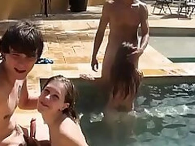 Teen coeds in bikini orgy by the pool